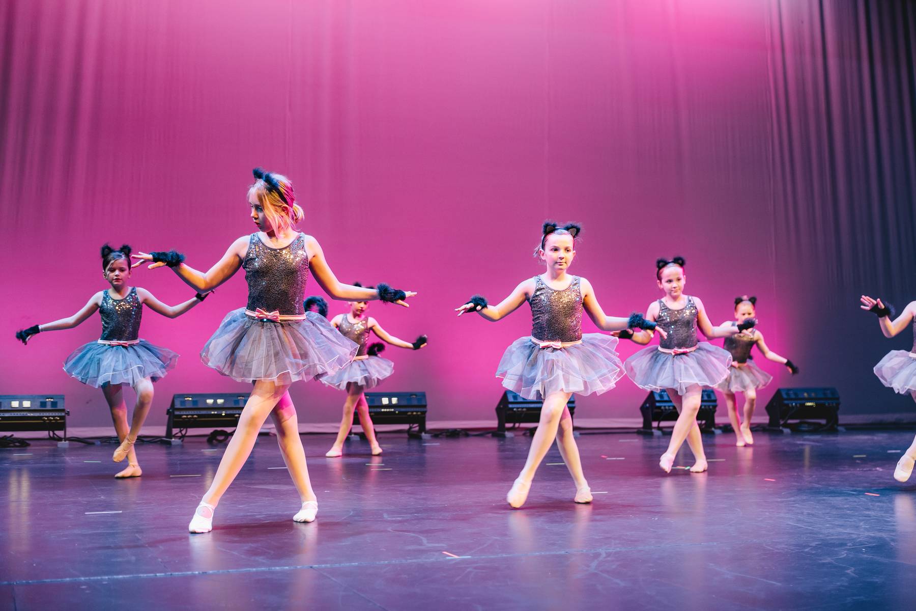Dancer leaping across the stage