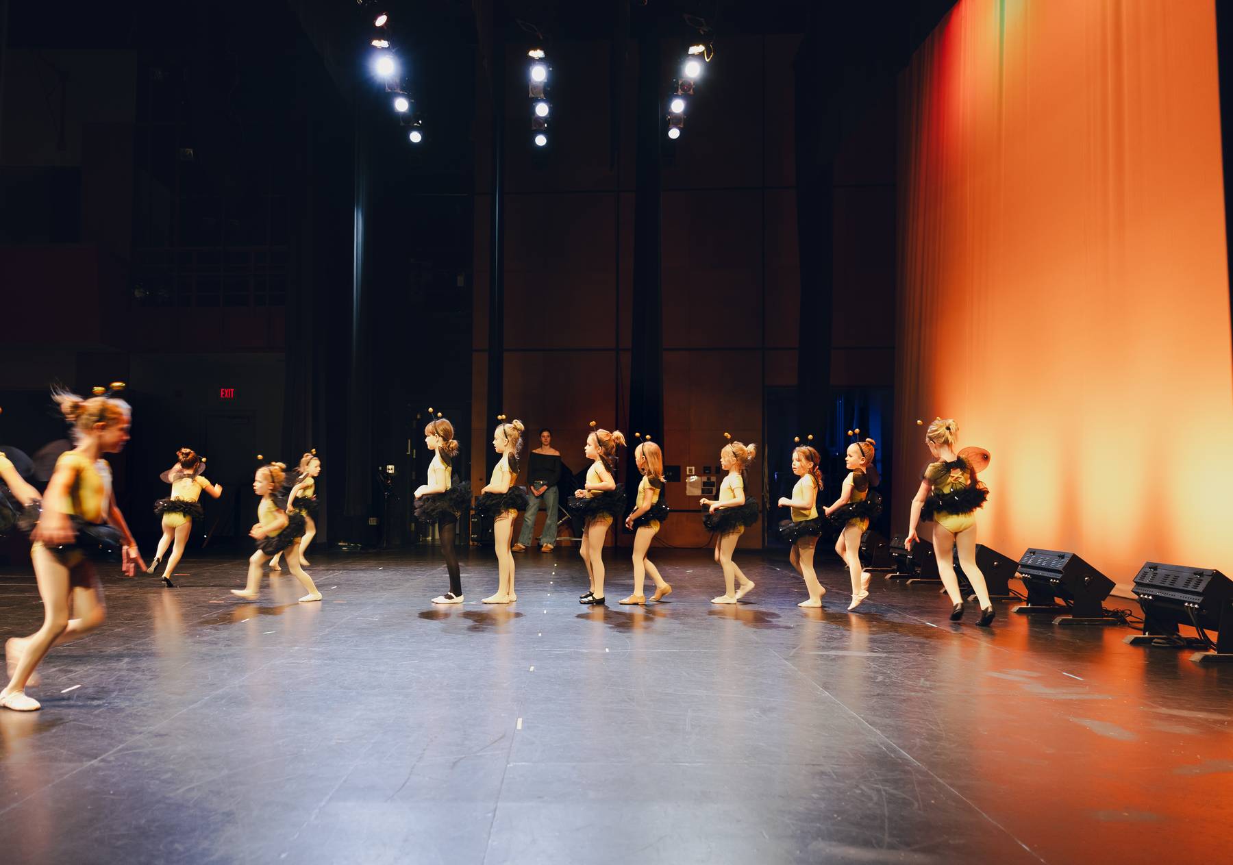 Dancers performing in a theater